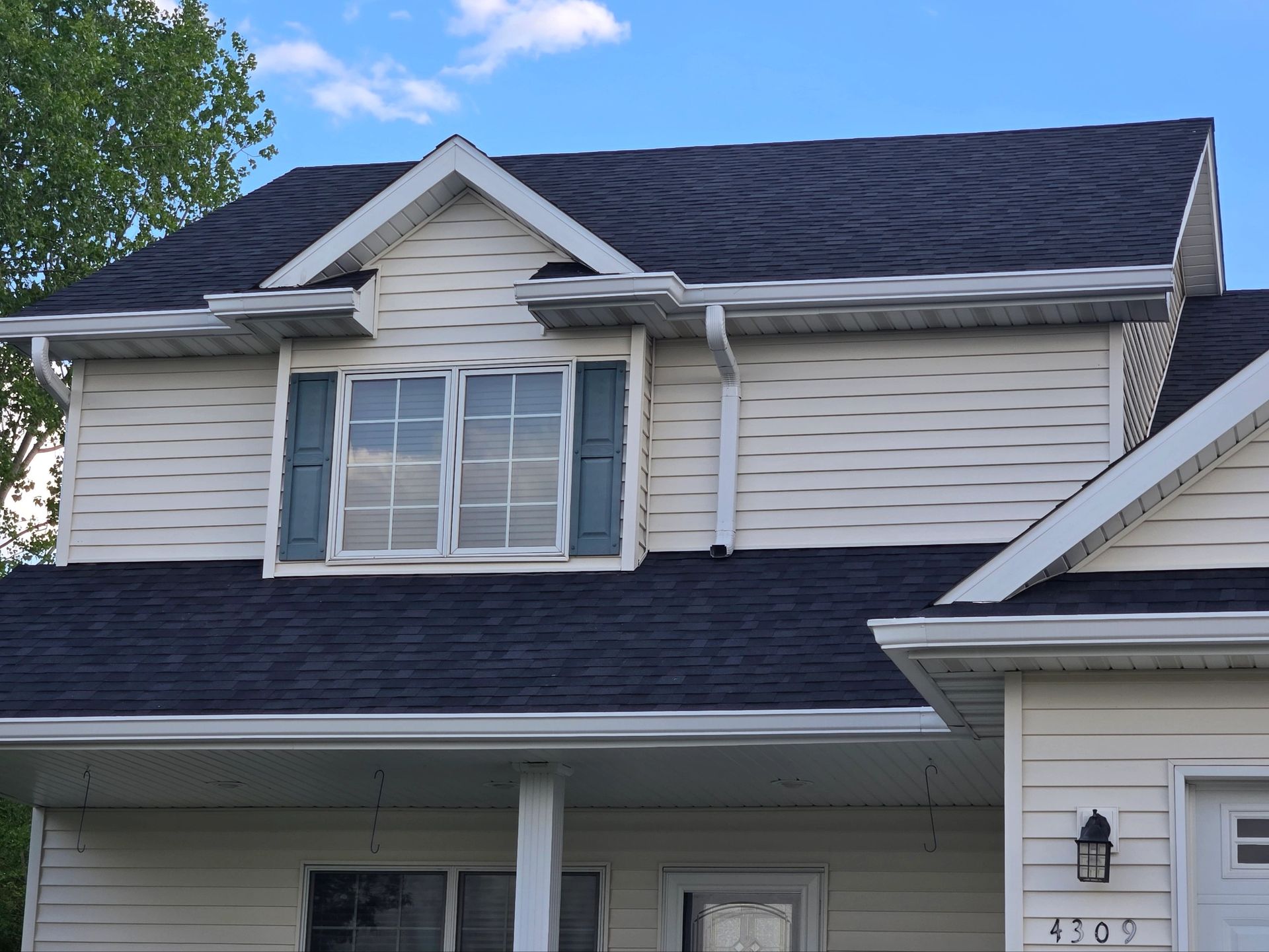 Clean home exterior and gutters.